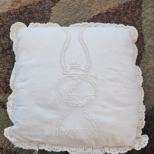 Ivory hand embroidered pillow with lace trim